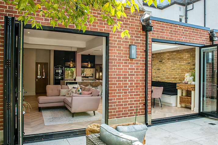 view inside the house, of the living room and kitchen from the outside garden