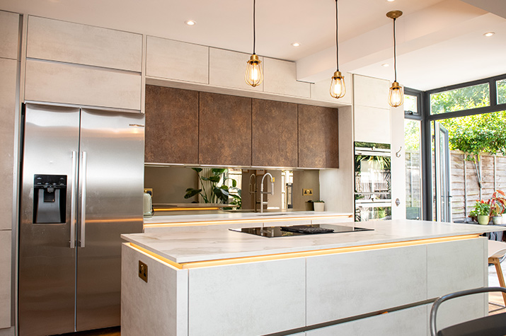 kitchen island and fridge with view to the garden