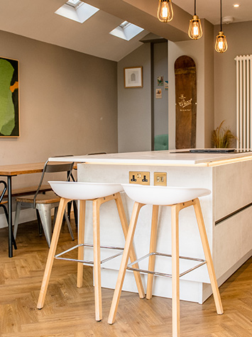 kitchen island and white chairs