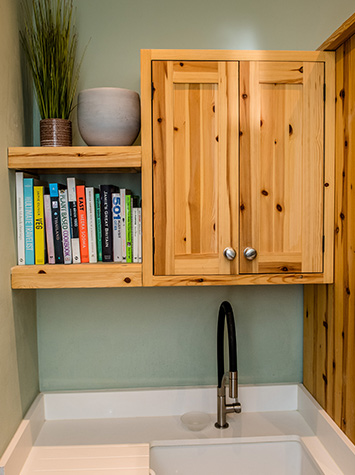 utility room cupboard and book shelf